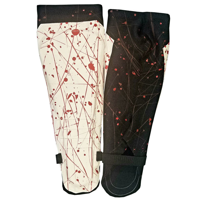 White with Red Paint Splatter on Black Kickpads